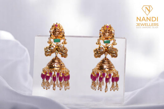 Gold Studded Laxmi Peacock Jhumkas With Beads